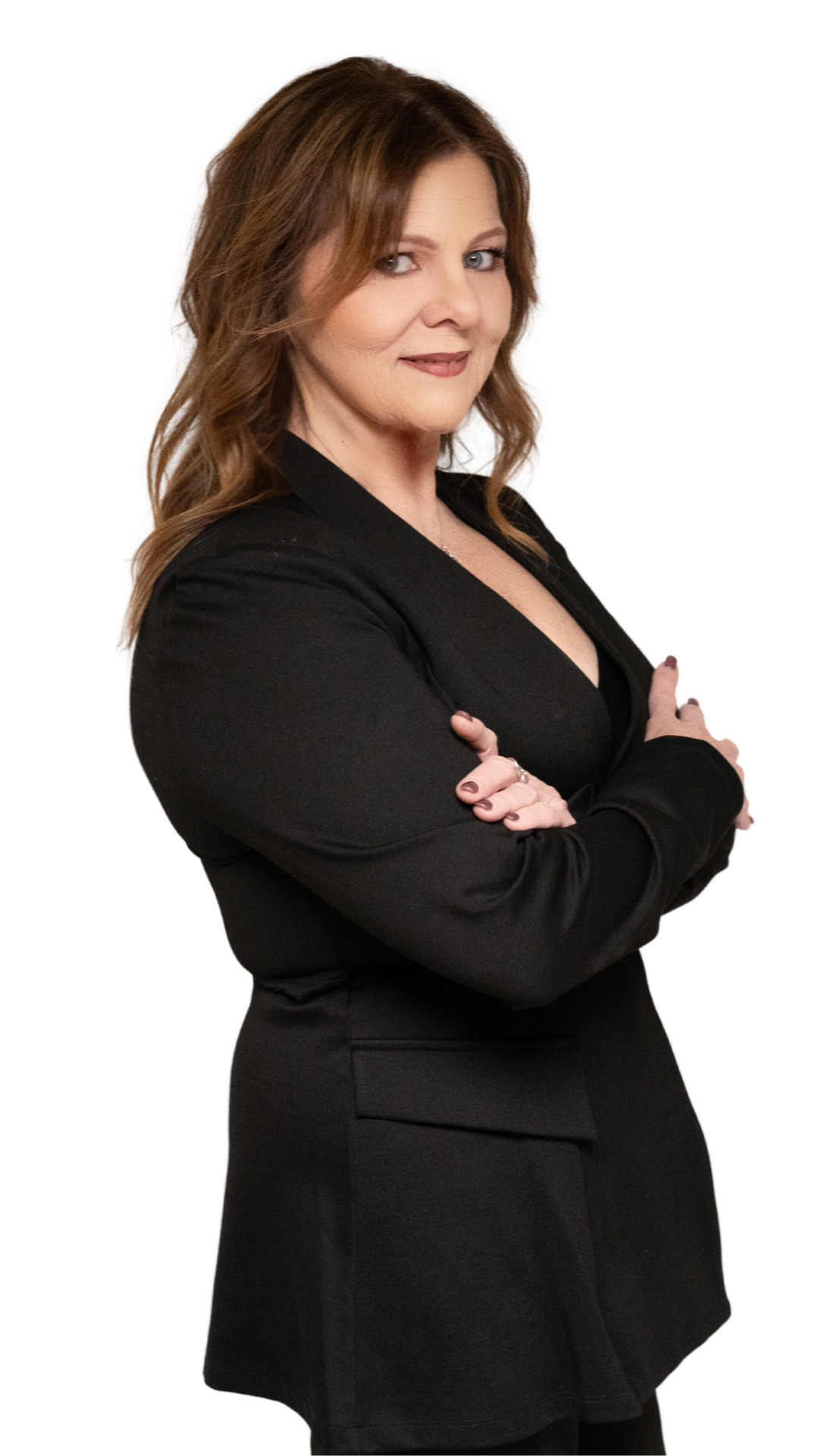Woman wearing a black blazer with arms crossed, looking directly at the camera.